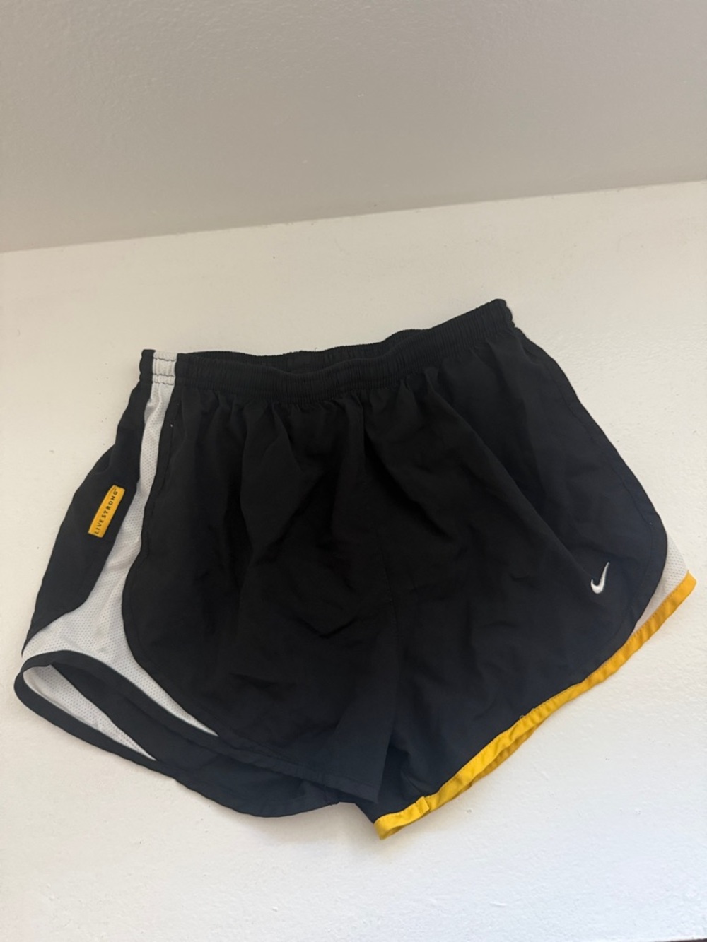 Nike Black Athletic Shorts with Yellow Trim